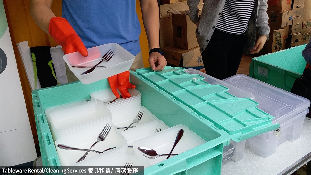 Reusable tableware with bowls, forks and spoons ready for lending to participants