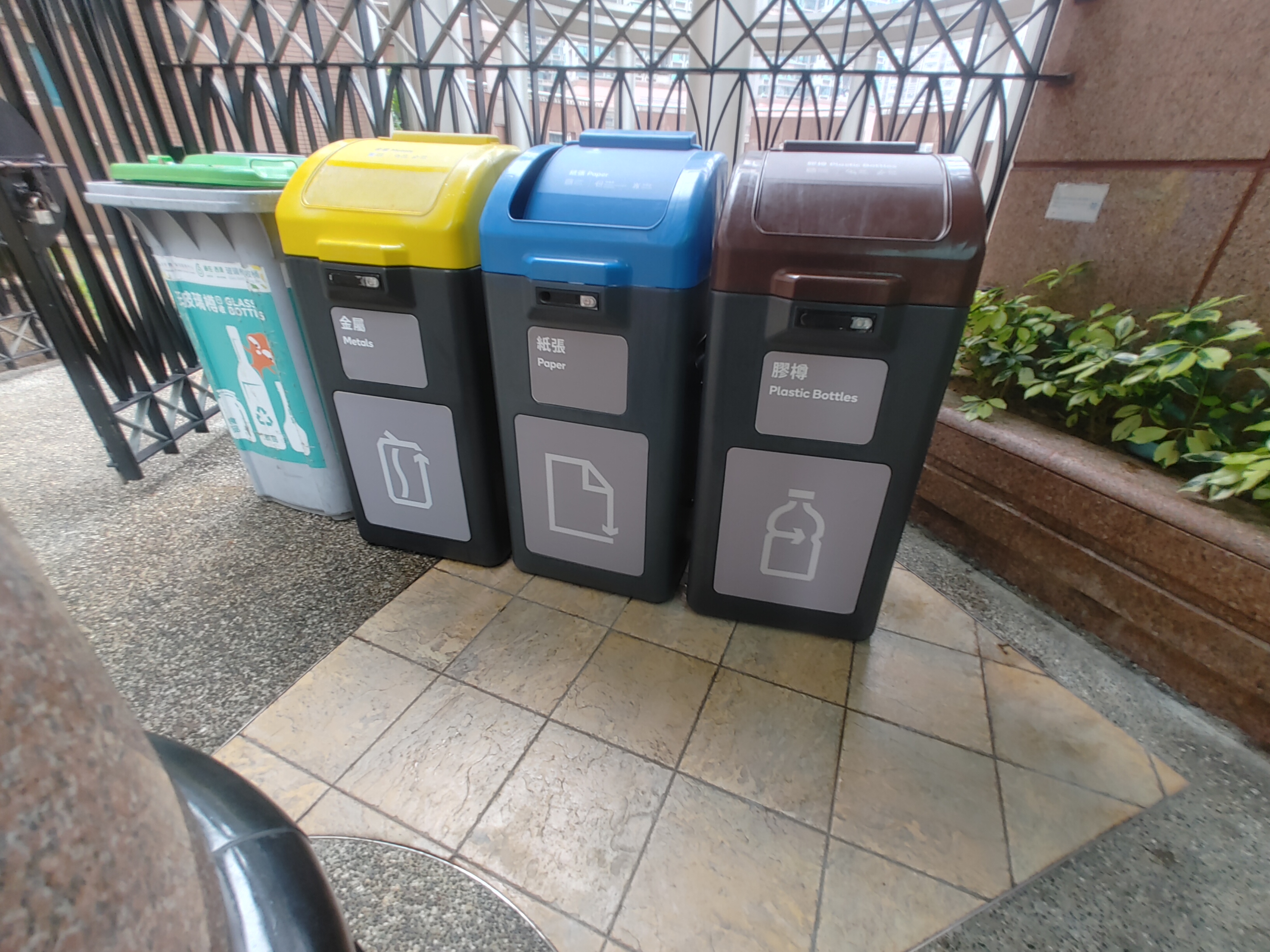 Waste Separation Bins for collecting different types of recyclables, including paper, metals, plastics and glass bottles